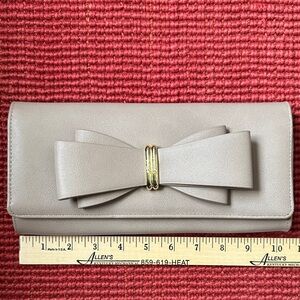 Betsey Johnson Elegant Taupe Clutch with Bow Accent